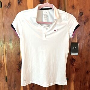 Nike, girls L, white dry fit, tennis/golf top.Black and purple accent on sleeve